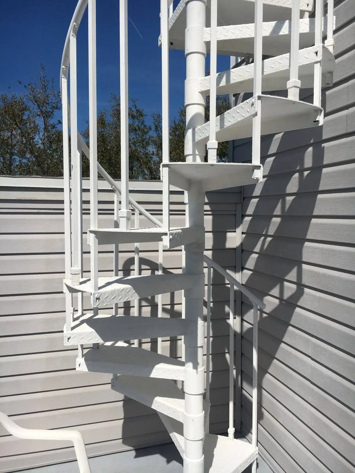 The same staircase and landing cleaned back to bare surface
